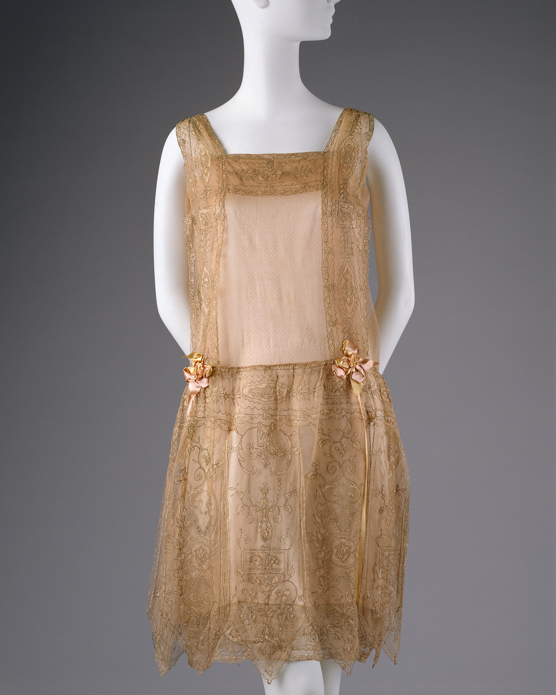 A 1920s evening dress of metallic lace over silk, attributed to Callot Soeurs